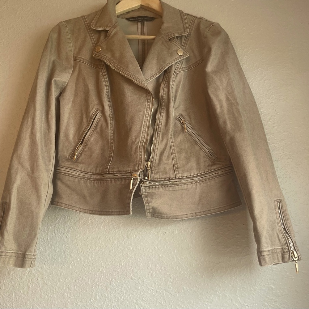 Size 10P Jacket with gold tint with gold buttons and zippers. The